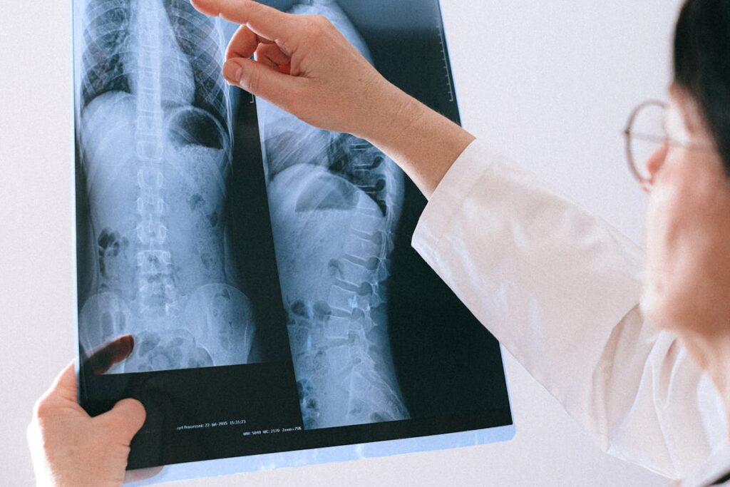 A doctor looking at the X-Ray